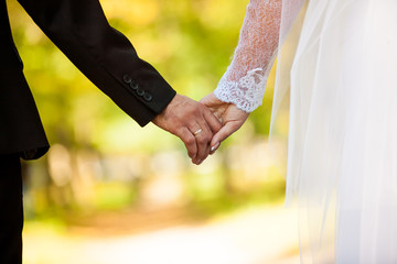 young couple holding hands