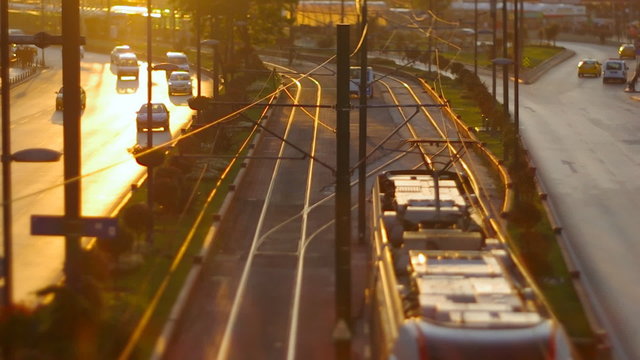 Istanbul modern tram moving down in old town at sunset. Shot usi