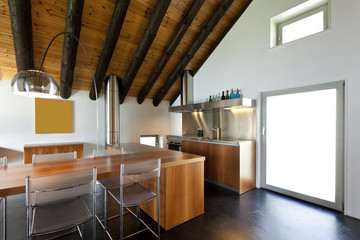Fototapeta na wymiar beautiful mountain home with modern furniture, kitchen