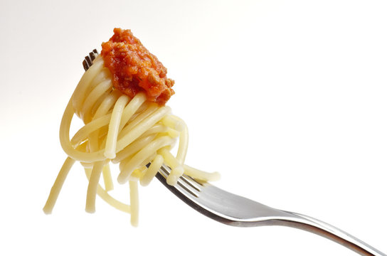 eating spaghetti bolognese
