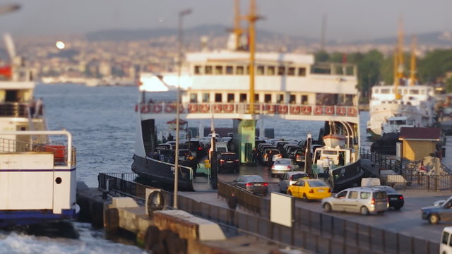 Cars and passengers boarding on to a ferry