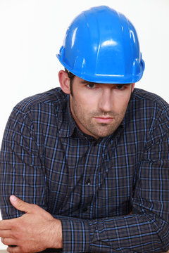 pensive man with a helmet