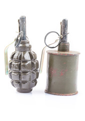 Fototapeta premium Close-up of old training grenades isolated on a white background