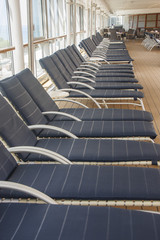 Blue Chaise Lounges LInes up on Cruise Deck