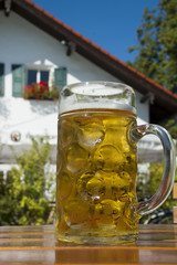 Bavarian Beer glass called Mass in beer garden - open-air pub