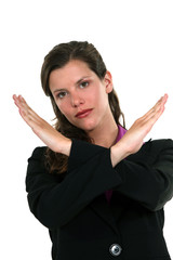Businesswoman making cross gesture