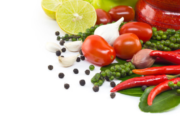 Fresh herbs and spices with wooden mortar
