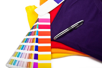 T shirts, color chart and pen