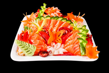 Mixed sashimi in white plate isolated on black background,with c