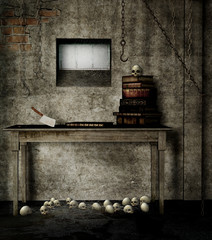 Stół z książkami i czaszkami w starej piwnicy