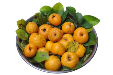 Fresh fruit quince in a metal bowl