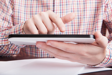 Man work with digital tablet