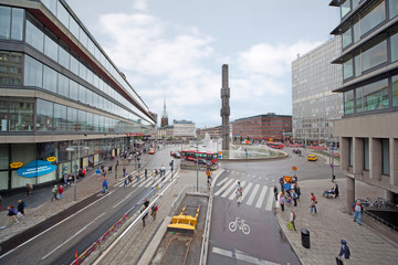 Pedestrians and cars are on street