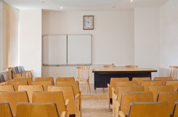 Conference room with chairs, blackboard