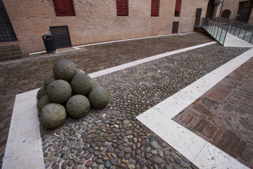 Group of stone at Castello Estense castle in Ferrara, Italy
