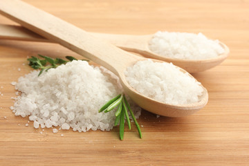 salt in spoons with fresh  rosemary and thyme