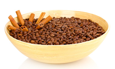 Coffee beans in bamboo bowl isolated on white