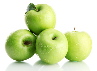 Ripe green apples with leaves  isolated on white