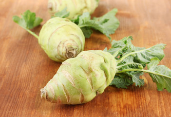 Fresh turnip on wooden background