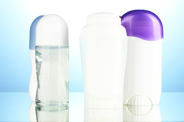 deodorant on blue background