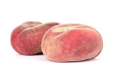 ripe fig peaches isolated on white.