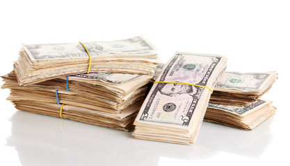 Stacks of dollars isolated on white