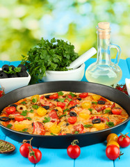 colorful composition of delicious pizza, vegetables and spices