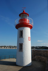 Lighthouse on a blue sky