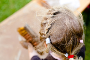 Obraz premium Mädchen mit Zöpfen