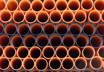 orange plastikröhre gestapelt