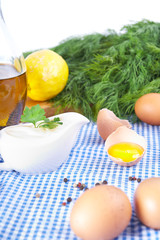 mayonnaise ingredients on tablecloth