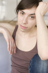 portrait of happy young woman in studio