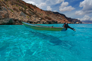 Boat, sea and rocks