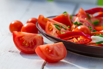 Closeup of salad made from tomato and mozzarella