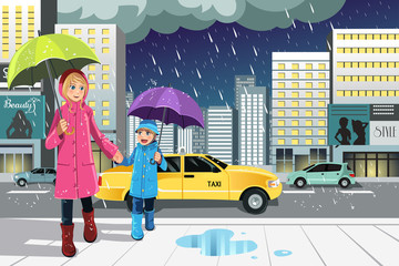 Mother daughter in the rain