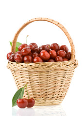 sweet cherry in basket isolated on white