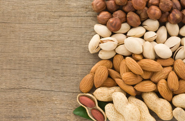 set of nuts fruit and  on wood