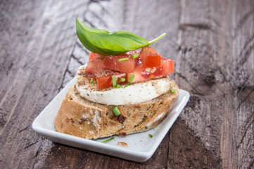 Piece of Mozzarella Cheese on a baguette