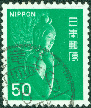 stamp shows wooden statue Miroku Bosatsu in Monastery Chuguji