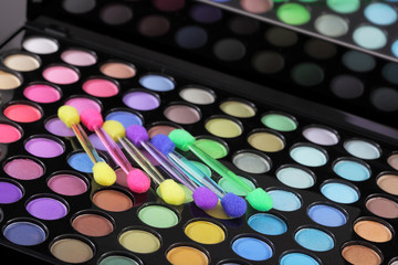 Eyelashes, make-up brushes, eye shadows palette