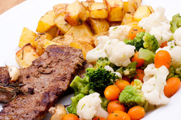 grilled steak and vegetables