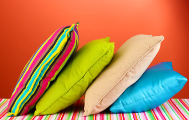 pillows on red background