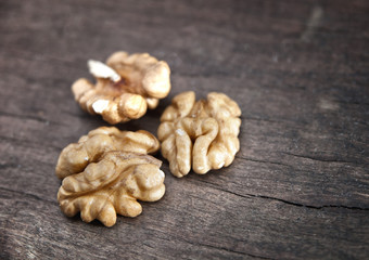 walnut on  wooden plank
