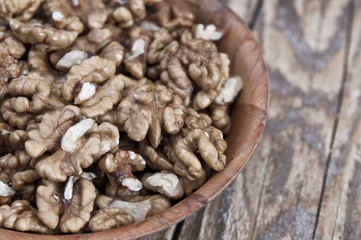 walnut in wooden bowl