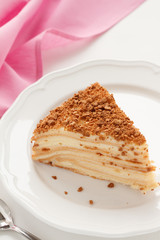 Romantic serving of Napoleon cake