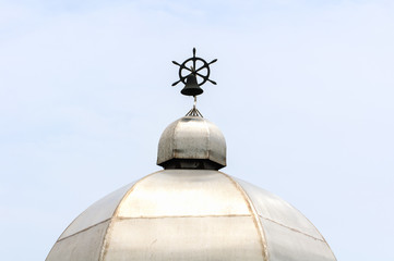 Fototapeta na wymiar The bell on the roof