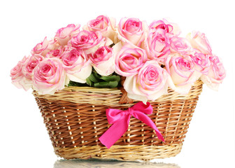 Fototapeta na wymiar beautiful bouquet of pink roses in basket, isolated on white