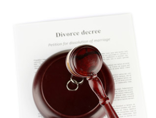 Divorce decree and wooden gavel on white background