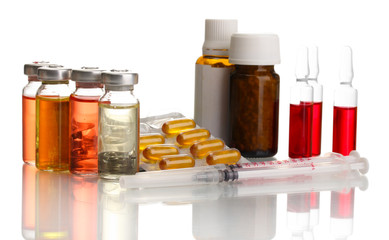 medical ampules, bottles, pills and syringes, isolated on white