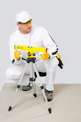 worker level measured with a laser level